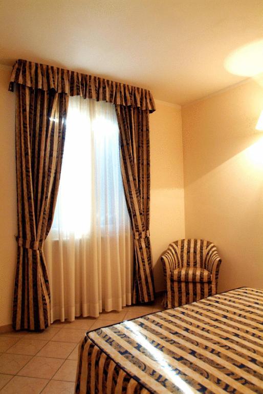 Hotel La Maddalena Quattro Castella Szoba fotó